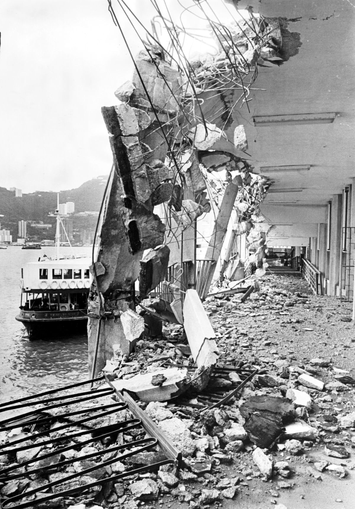 The Star Ferry Pier at Tsim Sha Tsui is left in ruins after being repeatedly battered by the Greek freighter Argonaut during Typhoon Hope