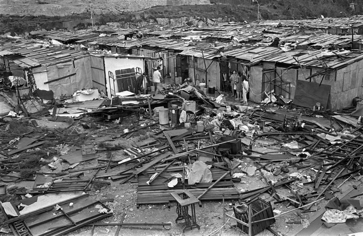 Fragile houses are left in ruins after Typhoon Rose ravaged Sam Ka Tsuen