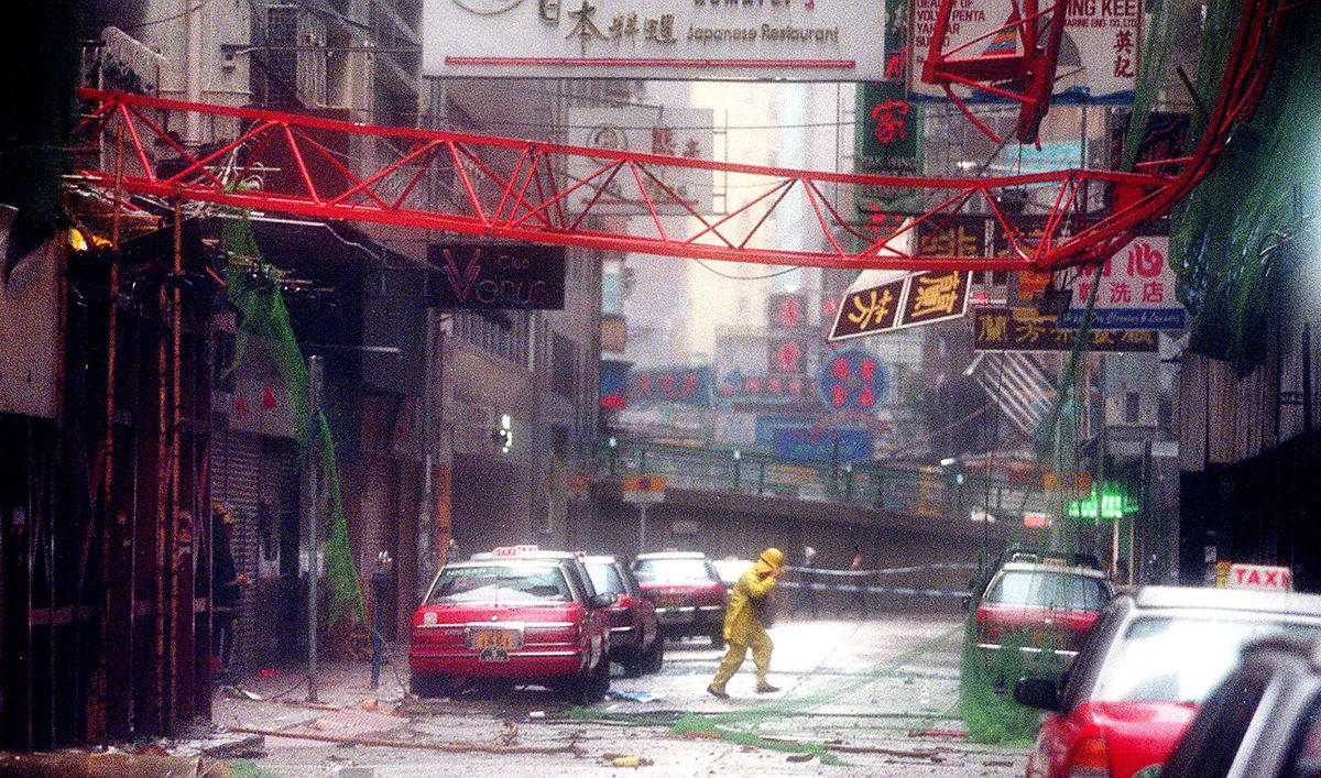 The boom of a crane lies across a Wan Chai street after Typhoon York blew it from its perch 30 floors up