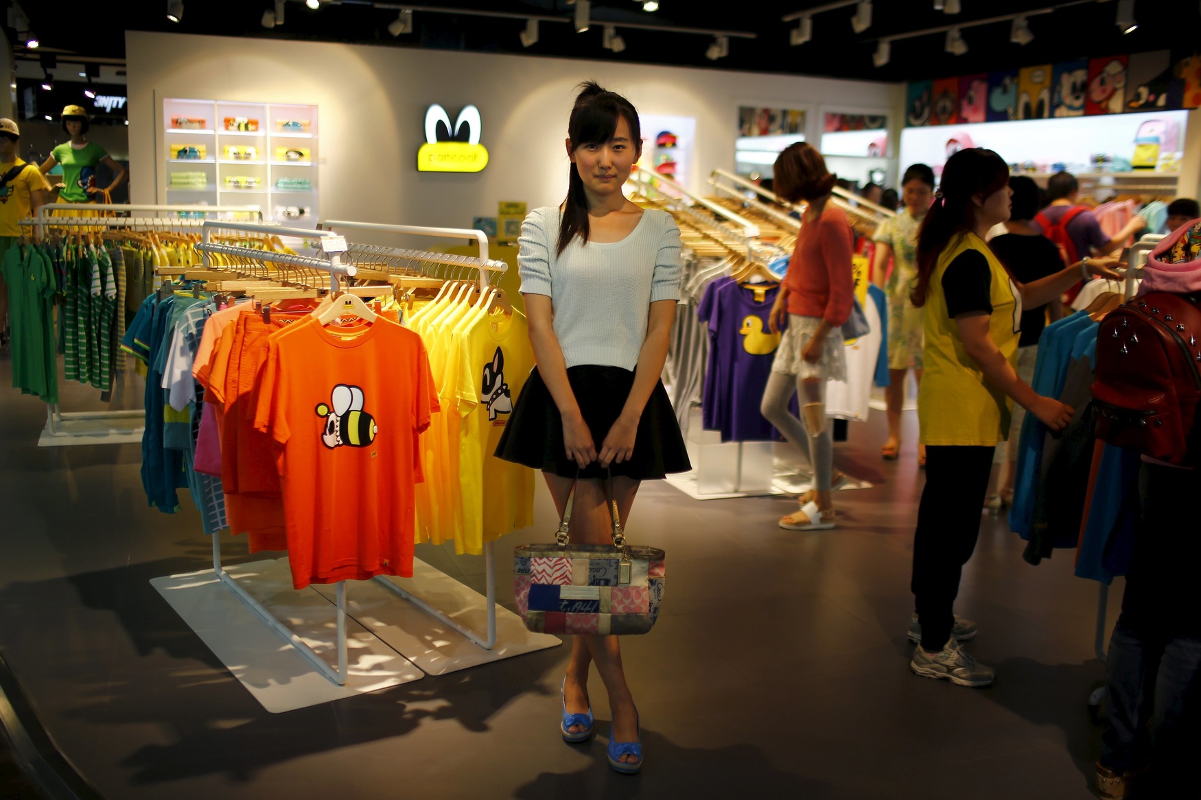 Lv Mengmeng, who was born in 1995, poses for a photograph in Shanghai August 22, 2014. When asked if she would like siblings, Mengmeng said: 'Maybe brothers, because I think they could protect me.'