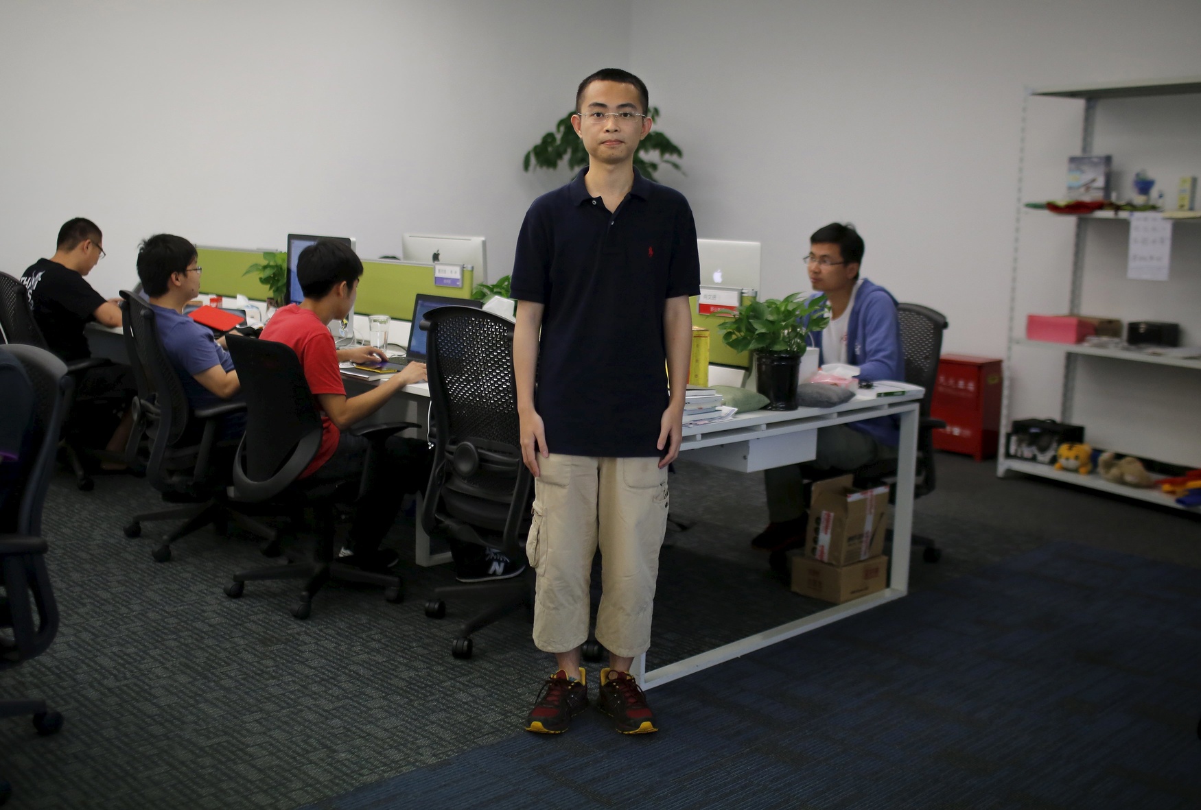 Xiao Wenjin, who was born in 1991, poses for a photograph in Shanghai July 29, 2014. 'I wish I had brothers and sisters because I think it's interesting. I wouldn't feel so lonely. We would have to share ... I like to share,' said Wenjin.
