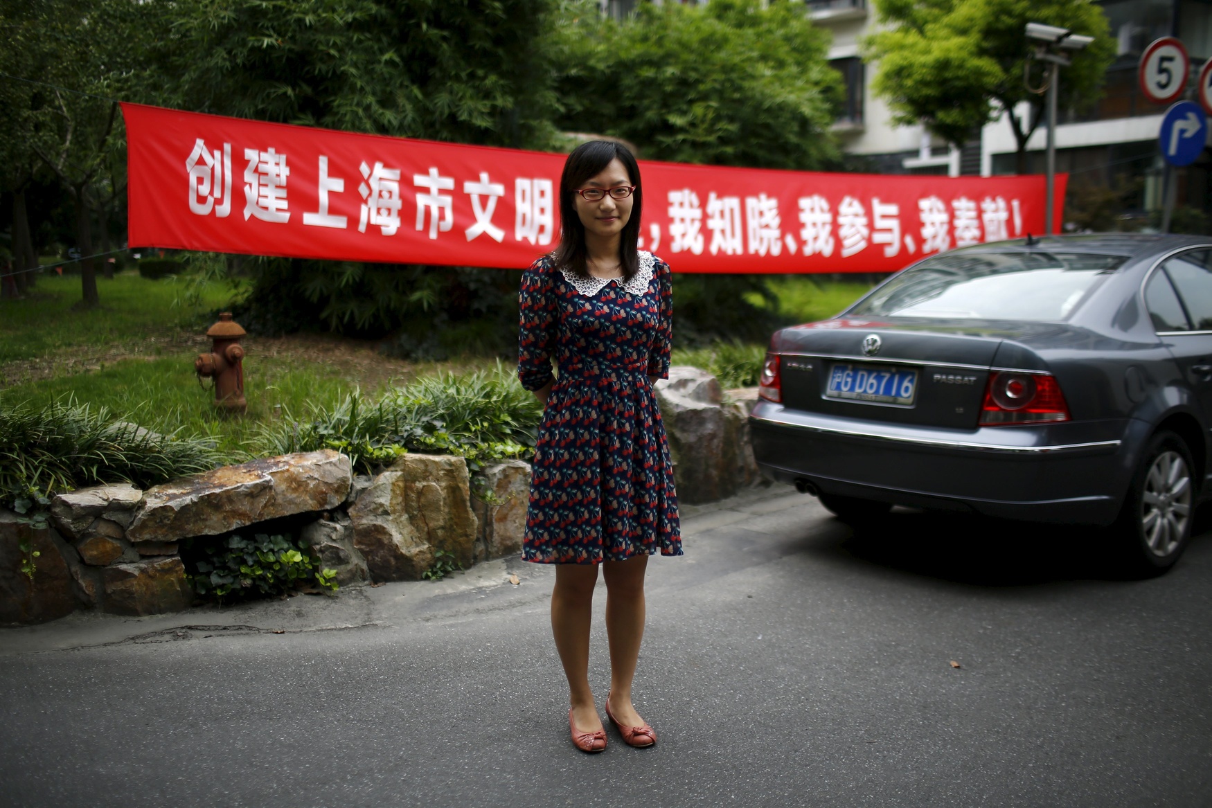 Zhu Wenjun, who was born in 1989, poses for a photograph in Shanghai August 24, 2014. Wenjun said: 'Of course I want to have a brother or a sister because being a single child is so lonely. I want to have someone to play with and grow up with.'