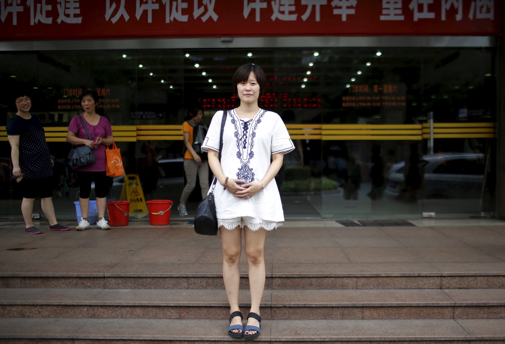 Chen Xuejun, who was born in 1987, poses for a photograph in Shanghai August 30, 2014. Xuejun said: 'I want to have an older brother. We could play together and he would protect me.'