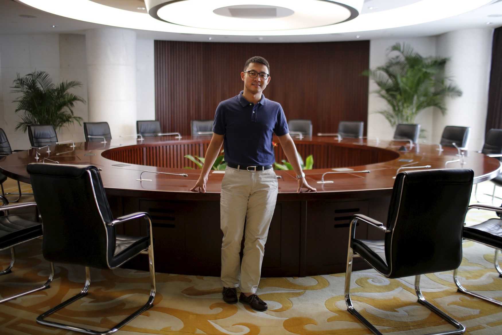 Huang Zheng, who was born in 1980, poses for a photograph in Shanghai August 28, 2014. Zheng said: 'I'd like to have a brother or a sister, because I would have someone to live and study with. If possible, I'd like to have an older sister. It's more appropriate and easier to communicate with a sister, rather than with your parents, when you're faced with some problems. I'm not saying I feel lonely. It just would make life more colourful.'