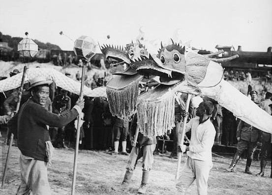 Chinese entertain British troops in France. Dragons ready for the Dragon fight. Photo: National Library of Scotland